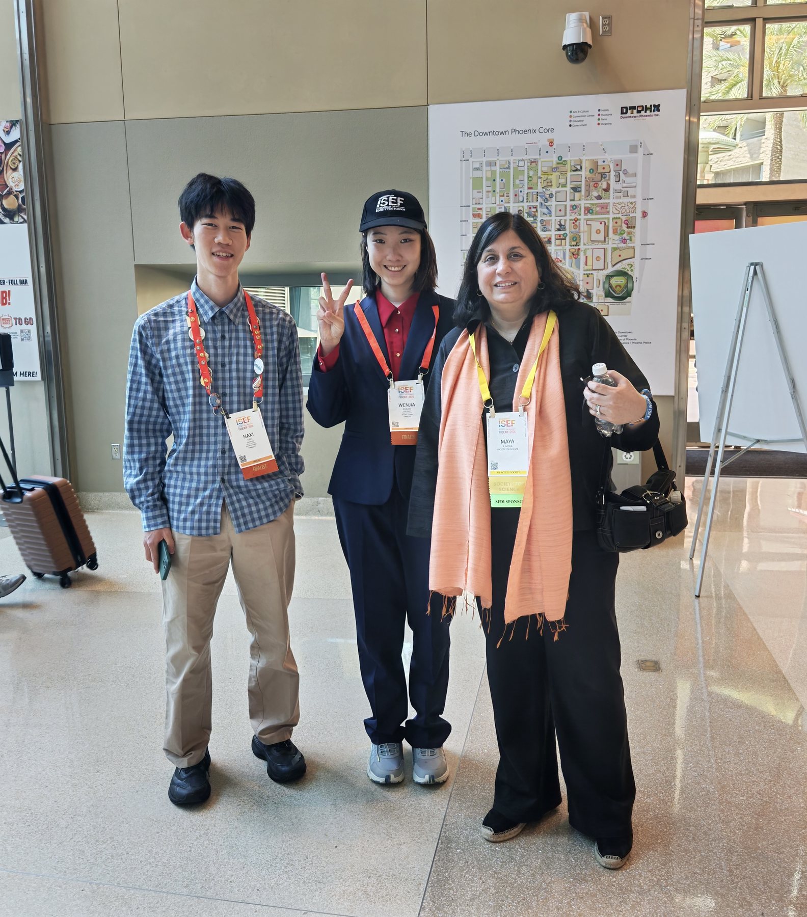 Tenne with mentors at a science competition