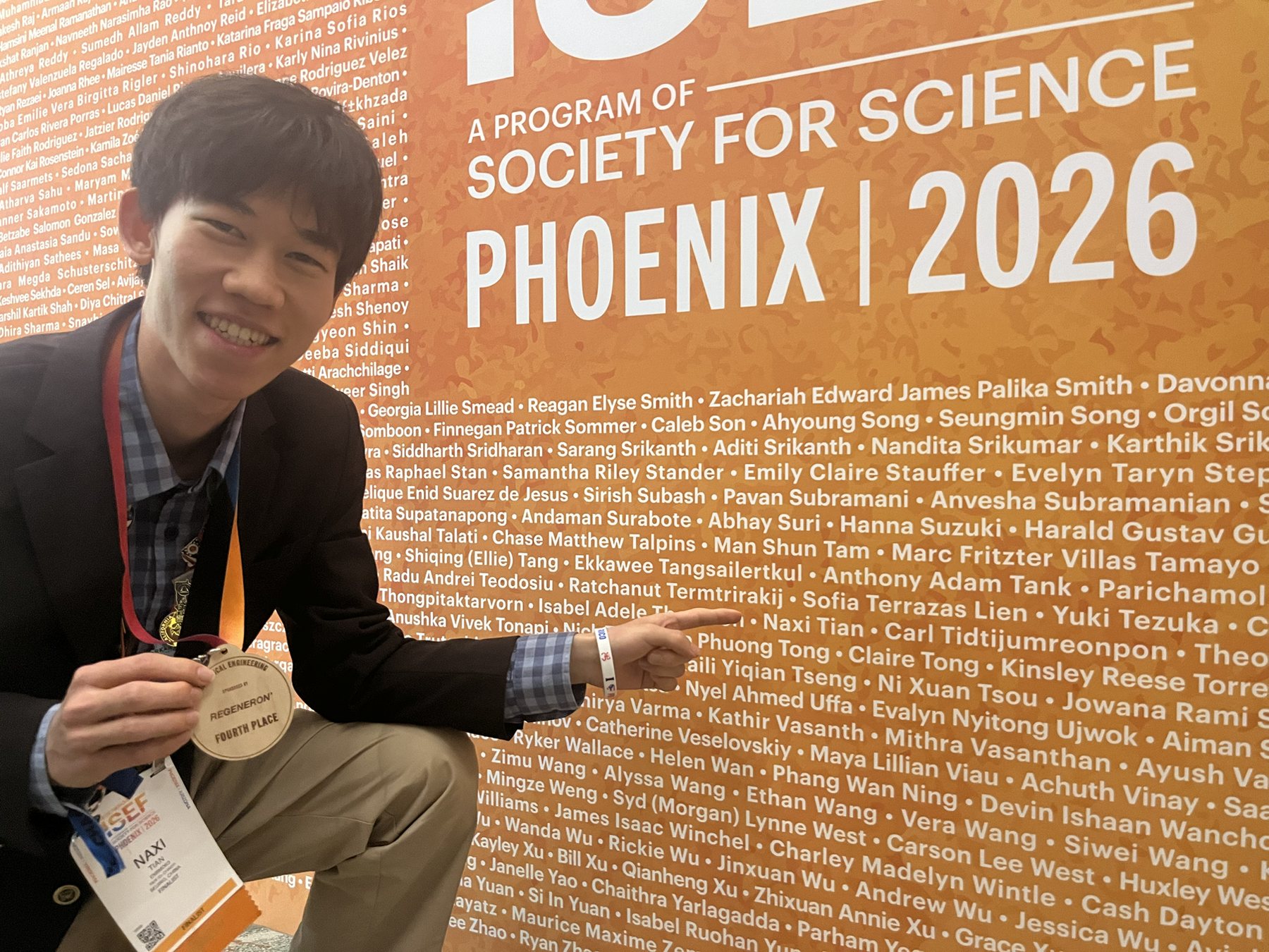 Tenne with an ISEF medal in Phoenix