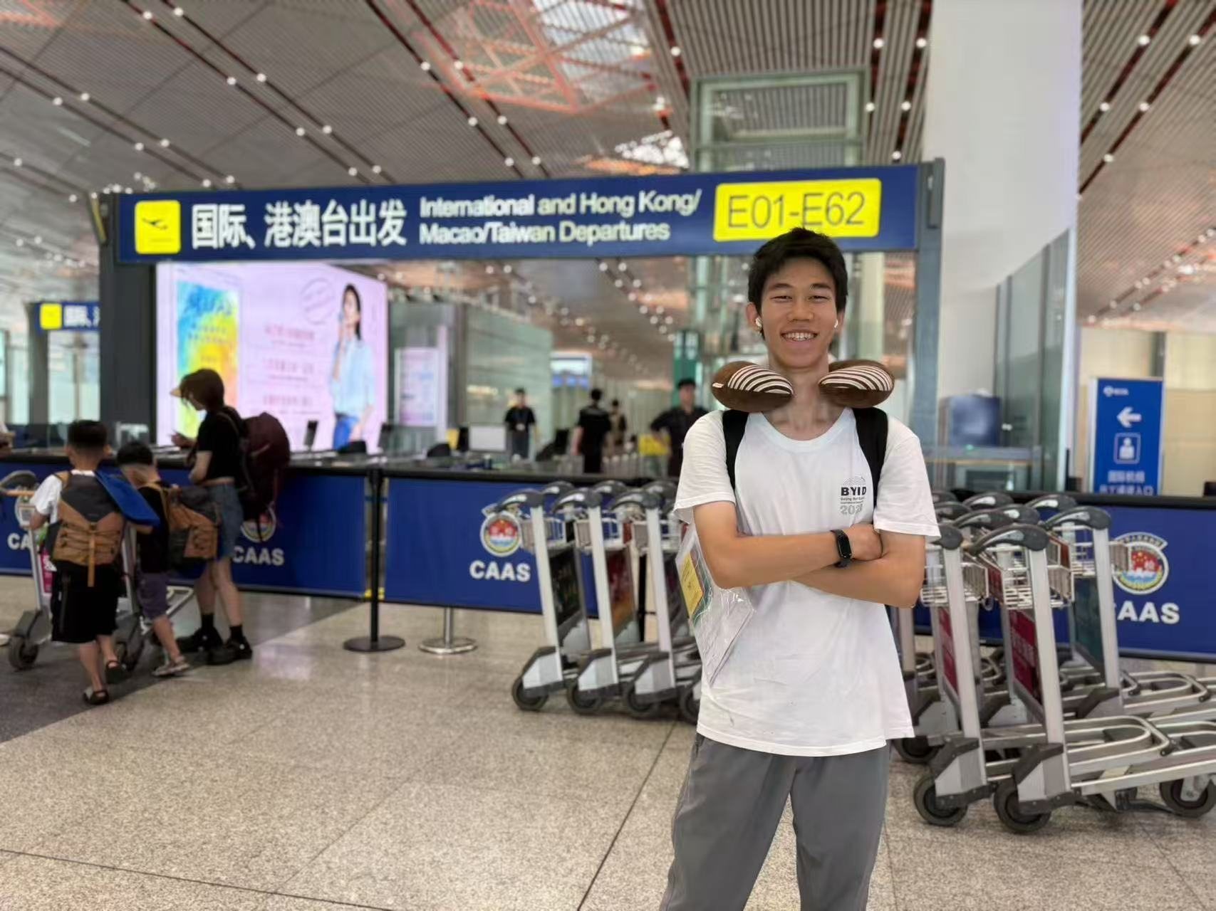 Tenne at an airport during competition travel